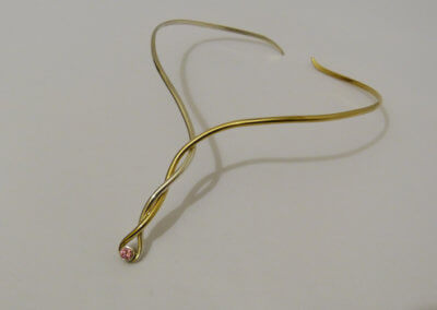 9ct yellow and white gold twist necklet set with pink sapphire