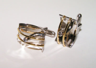 Silver and 9ct yellow gold diamond set cufflinks