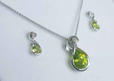 Peridot pendant and earrings